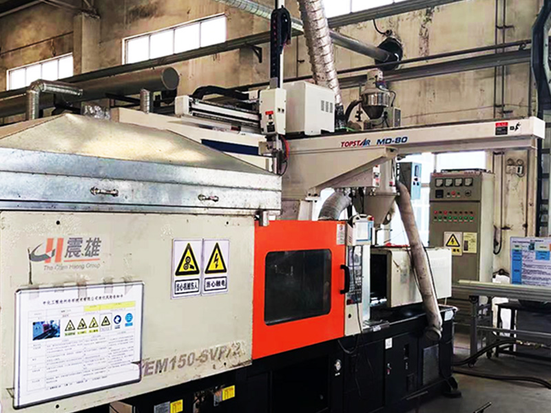 The company's injection molding machine's three-axis servo robotic arm was officially put into production